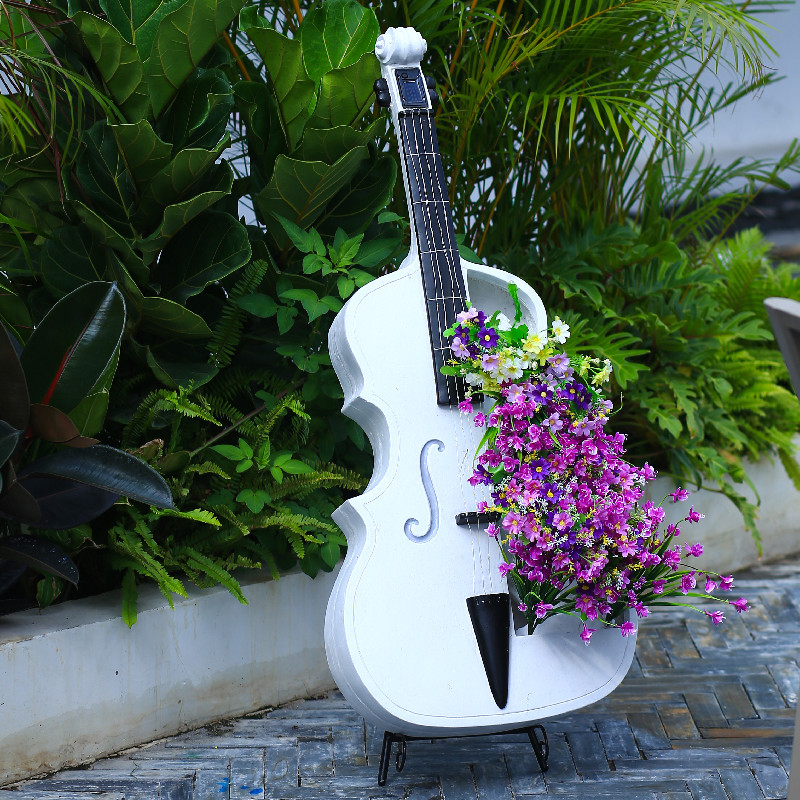 Statue de jardin en forme de v - Resin Art Sculptures avis et prix